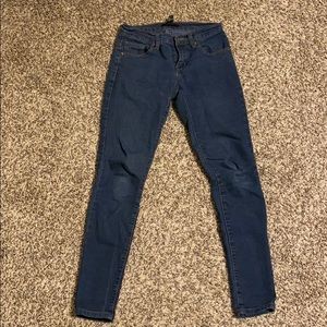 Dark denim skinny jeans.